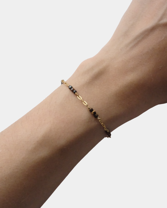 Bracciale con maglie allungate e pietre cubiche di occhio di tigre