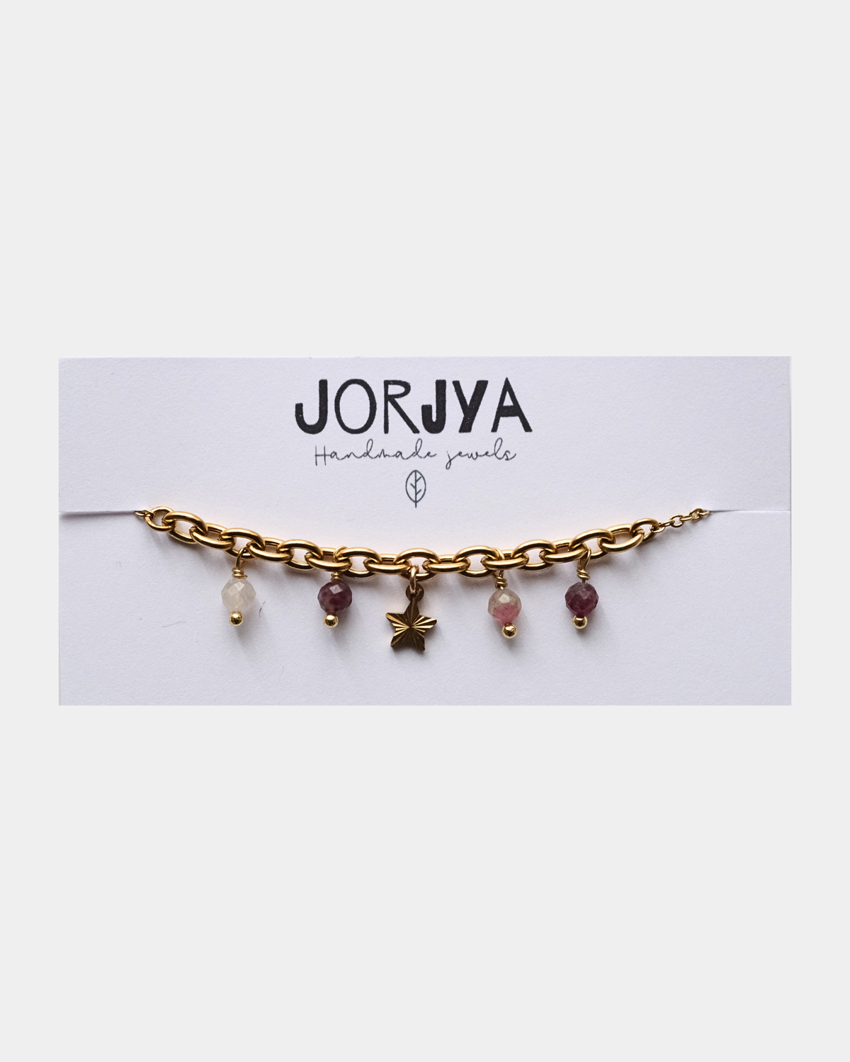 Bracciale con differenti maglie con pendente a forma di stella e pietre di tormalina