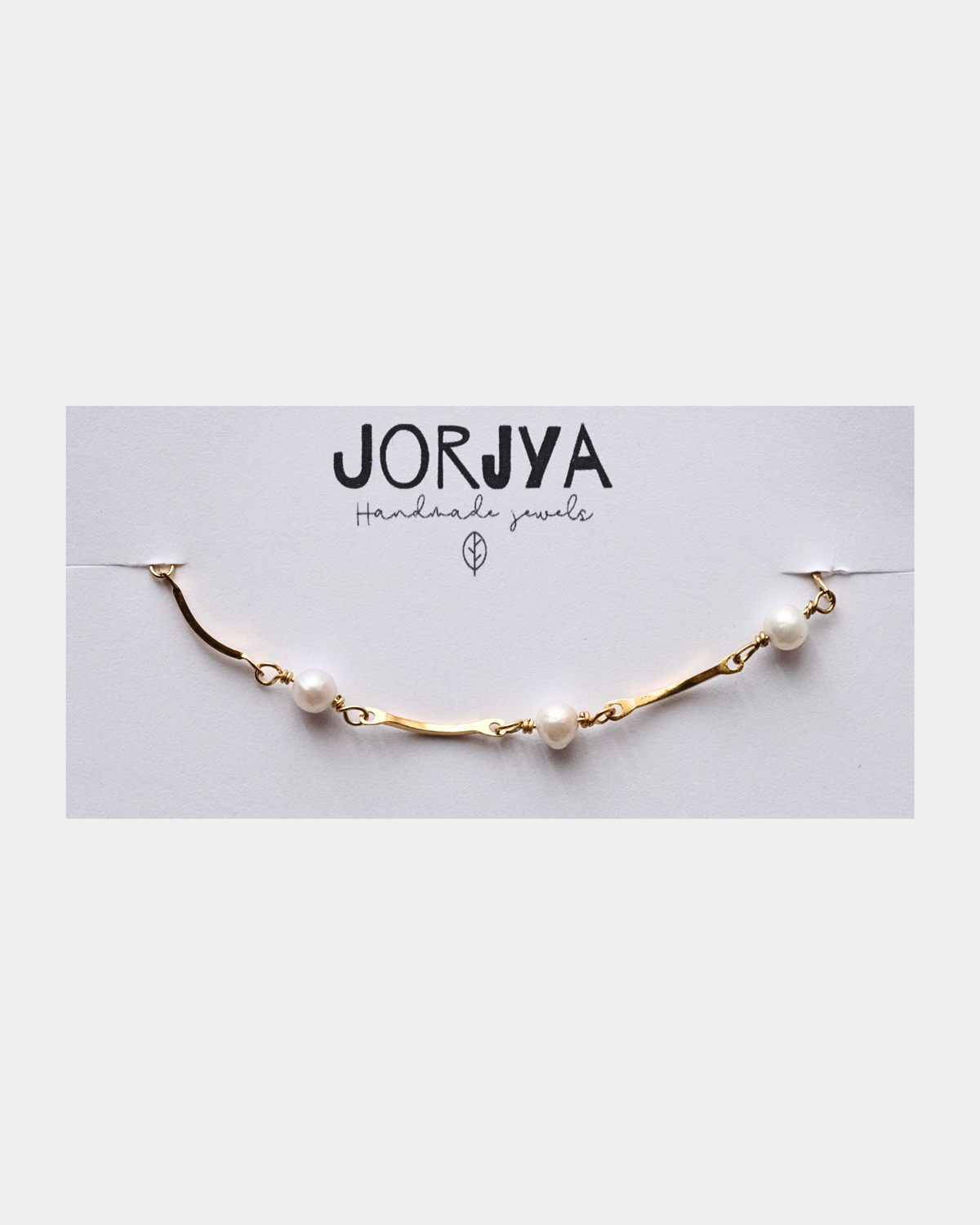 Bracciale con maglie ondulate e perle di fiume