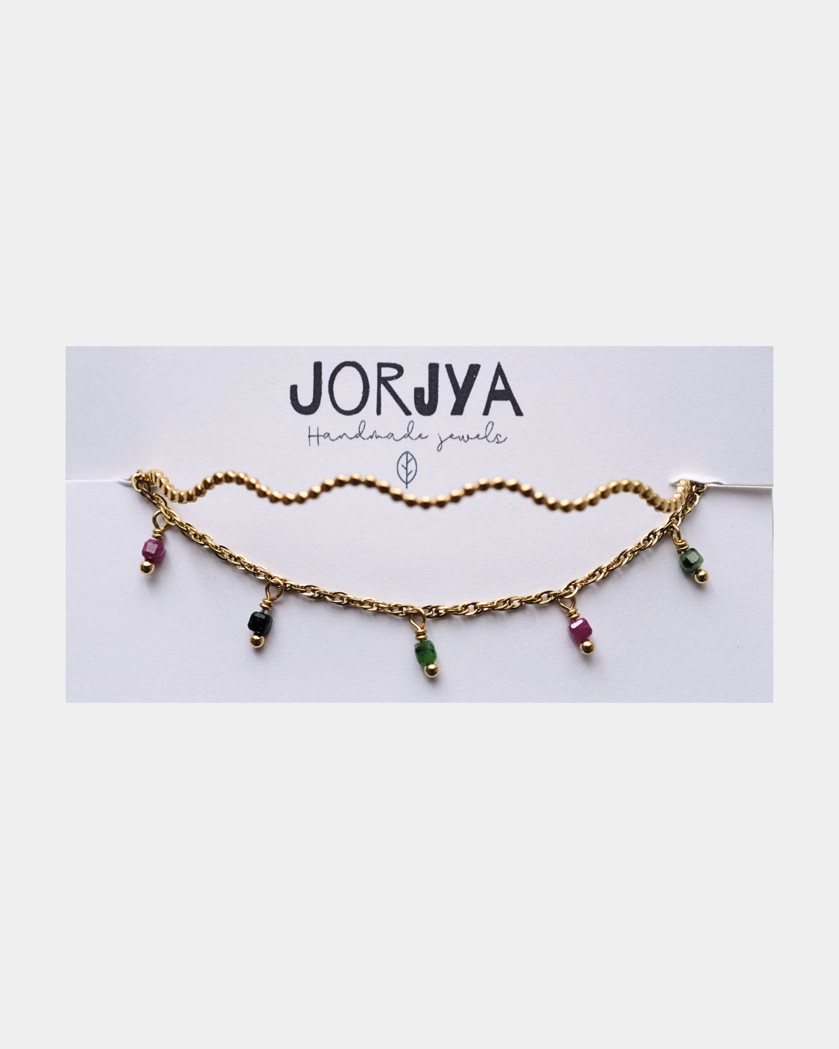 Set di due bracciali: uno rigido ondulato e uno con pietre di tormalina