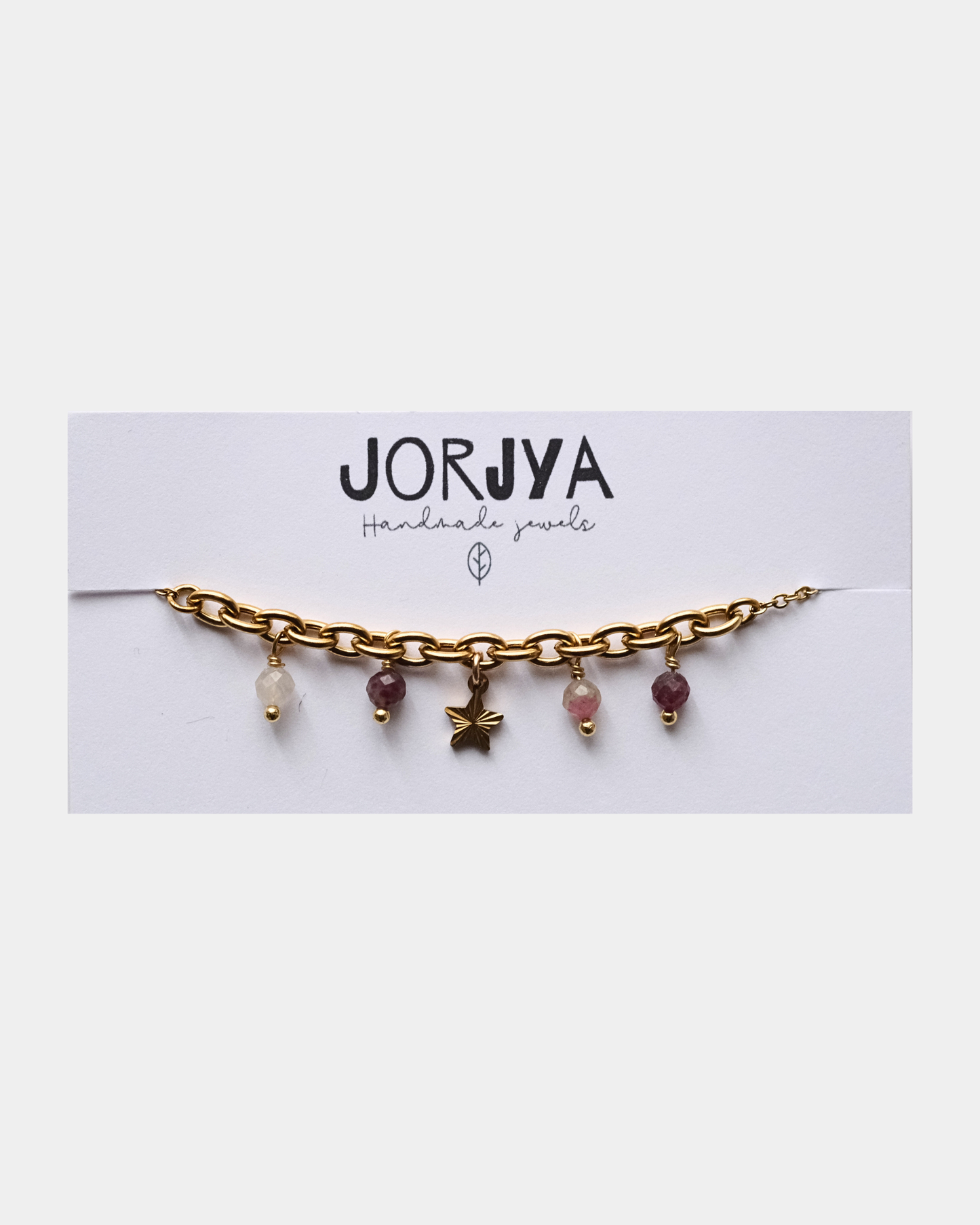 Bracciale con differenti maglie con pendente a forma di stella e pietre di tormalina