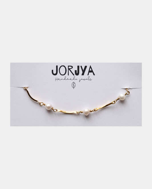 Bracciale con maglie ondulate e perle di fiume