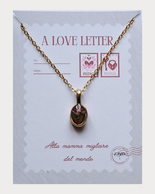 Collana con fiore di Erica rosa su base color cherry