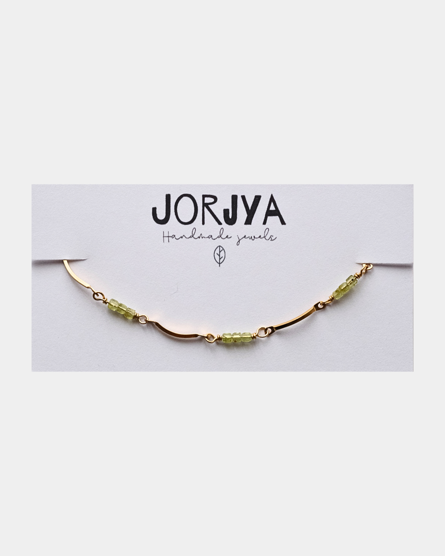 Bracciale con maglie ondulate e pietre di peridoto