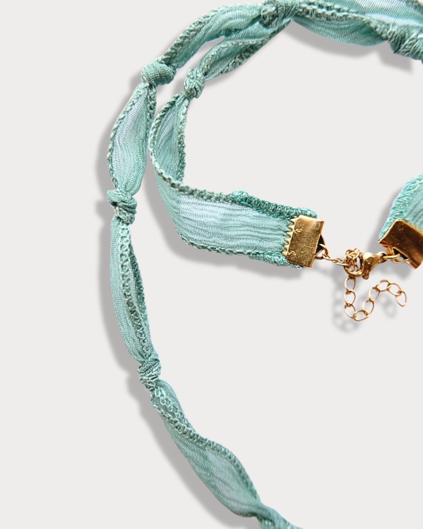 Collana in seta annodata azzurra con pendente a forma di stella marina e pietra di amazzonite