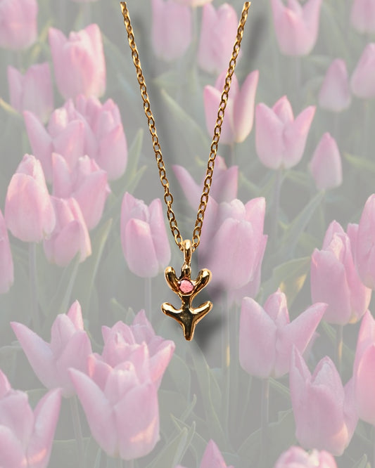 Collana con pendente a forma di tulipano in ottone con frammenti di petali