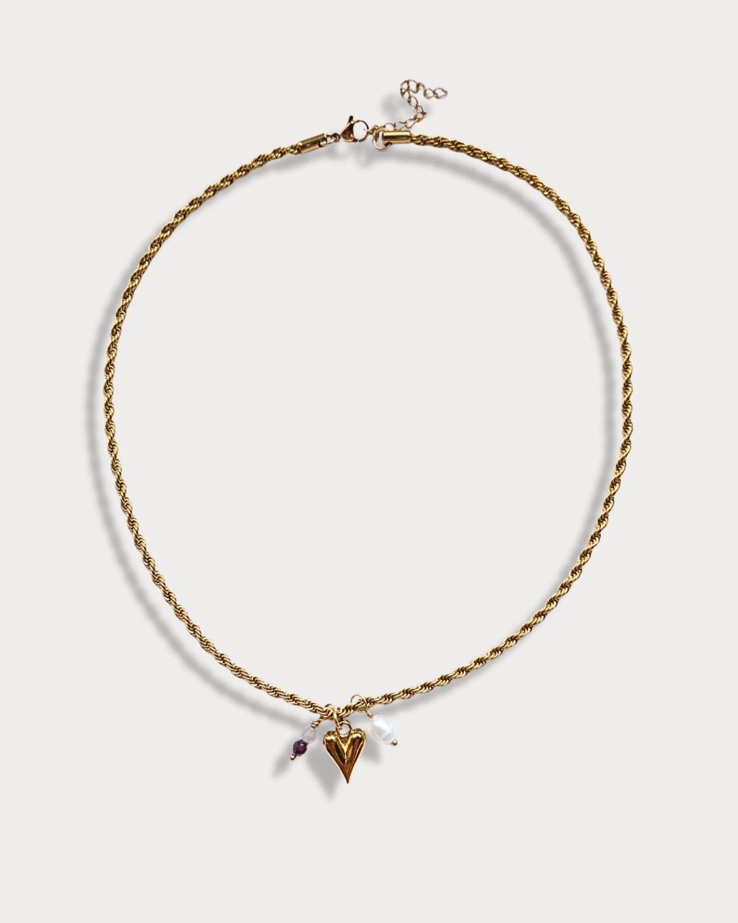 Collana a maglia intrecciata con pendente a forma di cuore, pietre di tormalina e perla di fiume