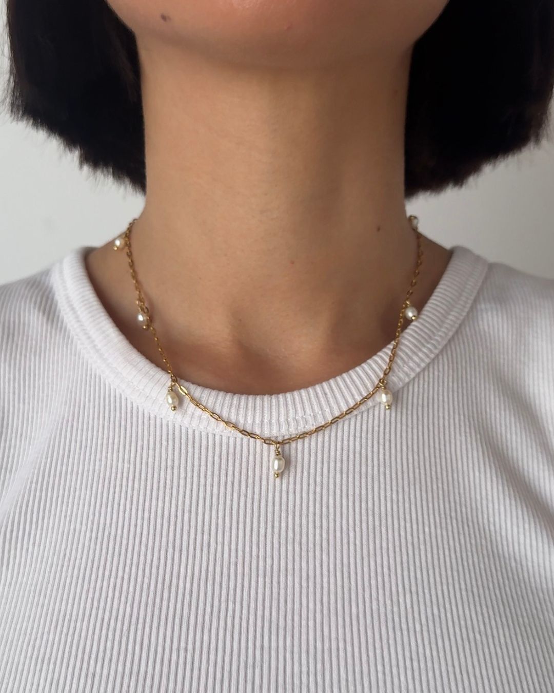 Collana a maglie sottili allungate con perle di fiume