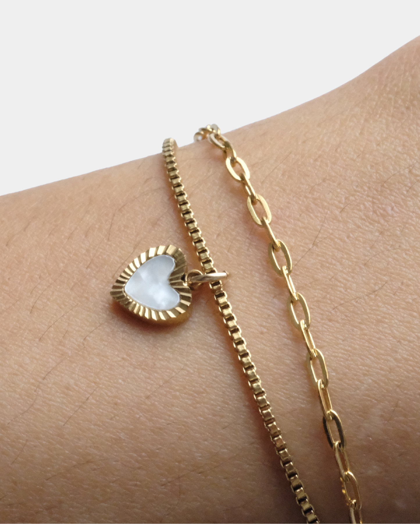 Bracciale con doppio filo con cuore effetto madreperla