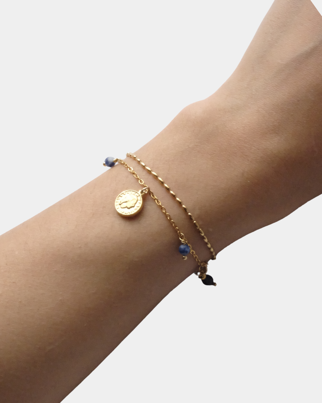 Bracciale con doppio filo con monetina e pietre di sodalite